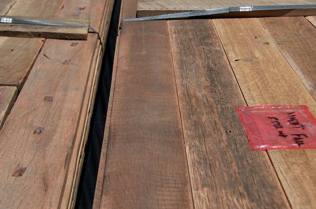 recycled wire-brushed timber flooring - ready to install in Nightfall wilderness camp's luxury tents (3)